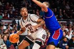 Nov 12, 2025; Columbia, South Carolina, USA; South Carolina Gamecocks forward Elijah Strong (31) attempts to get around Presbyterian Blue Hose forward Jonah Pierce (15) in the first half at Colonial Life Arena. Mandatory Credit: Jeff Blake-Imagn Images