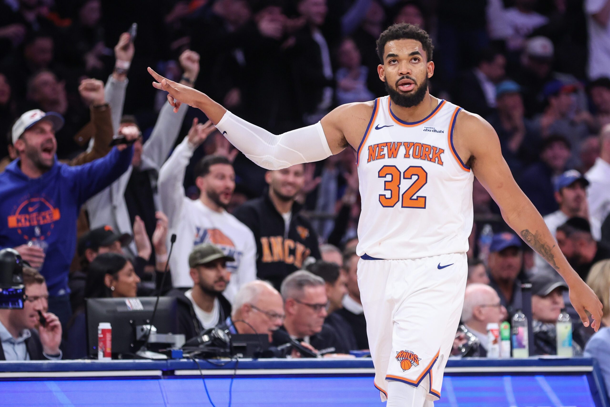 Nov 12, 2025; New York, New York, USA;  New York Knicks center Karl-Anthony Towns (32) gestures after scoring in the fourth quarter against the Orlando Magic at Madison Square Garden. Mandatory Credit: Wendell Cruz-Imagn Images