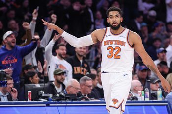 Nov 12, 2025; New York, New York, USA;  New York Knicks center Karl-Anthony Towns (32) gestures after scoring in the fourth quarter against the Orlando Magic at Madison Square Garden. Mandatory Credit: Wendell Cruz-Imagn Images