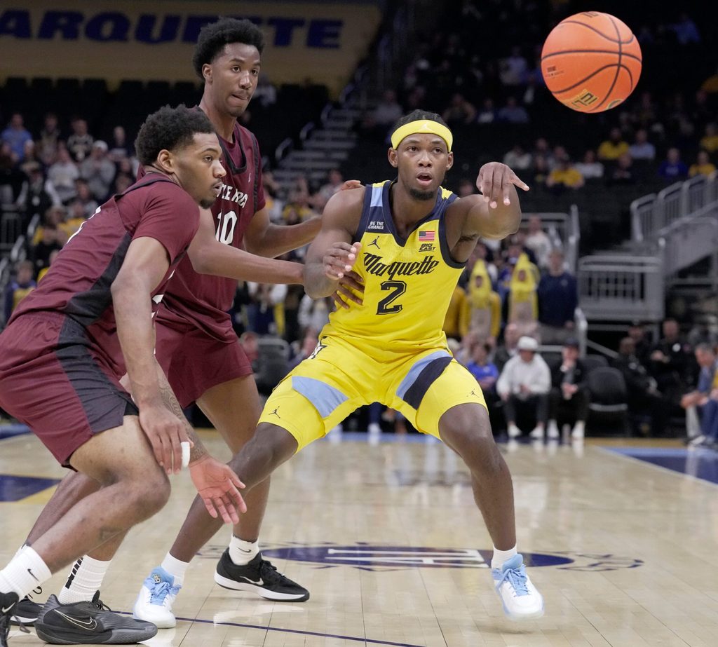 Marquette guard Chase Ross (2) passes the ball during the first half of their game against Little Rock Wednesday, November 12, 2025 at Fiserv Forum in Milwaukee, Wisconsin.