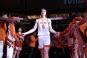 Nov 12, 2025; Austin, Texas, USA; Texas Longhorns center Matas Vokietaitis (8) enters the court before the start of the game against Fairleigh Dickinson at Moody Center. Mandatory Credit: Dustin Safranek-Imagn Images