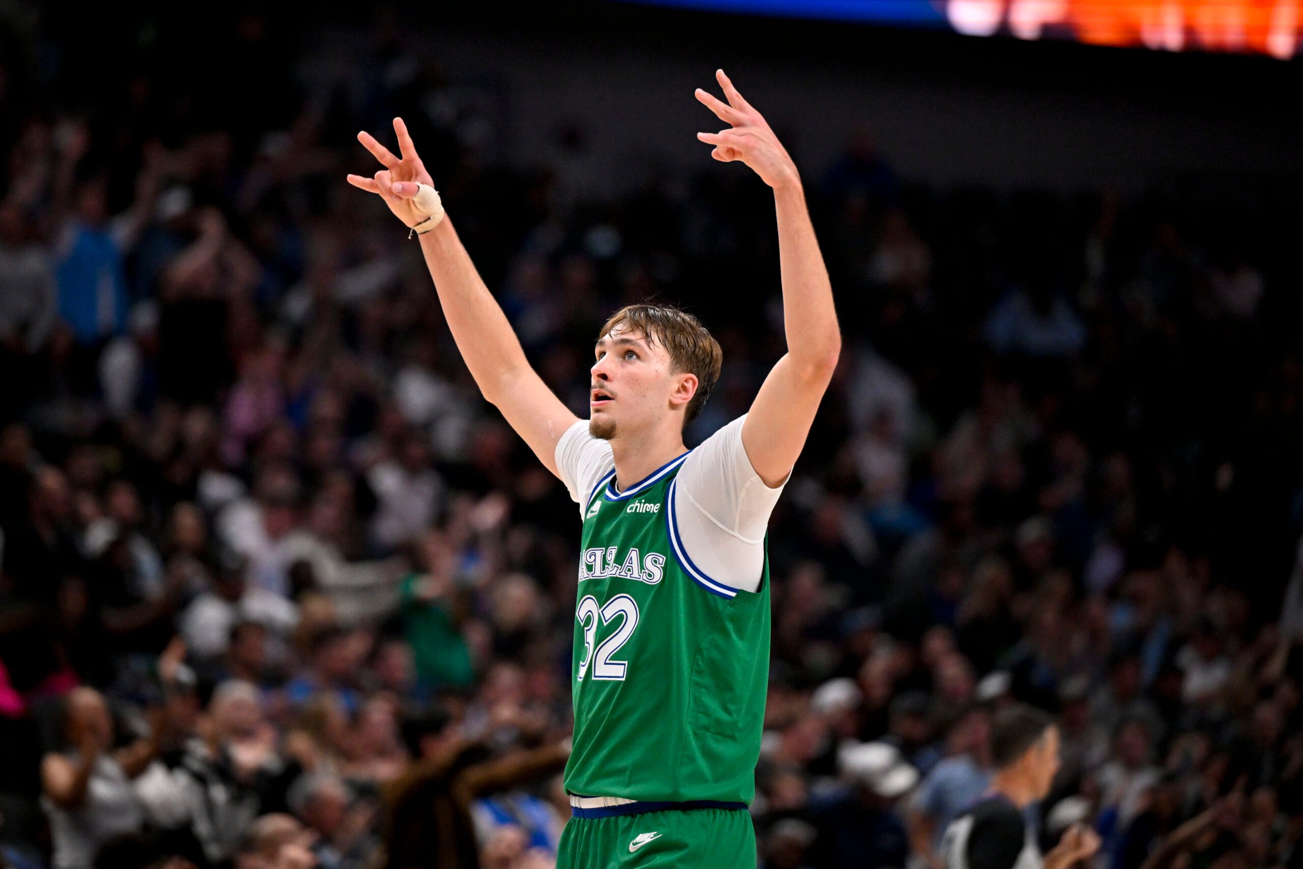 Nov 12, 2025; Dallas, Texas, USA; Dallas Mavericks forward Cooper Flagg (32) celebrates a three point basket by guard Max Christie (not pictured) against the Phoenix Suns during the second half at the American Airlines Center. Mandatory Credit: Jerome Miron-Imagn Images