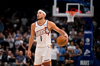 Nov 12, 2025; Dallas, Texas, USA; Phoenix Suns guard Devin Booker (1) brings the ball up court against the Dallas Mavericks during the second half at the American Airlines Center. Mandatory Credit: Jerome Miron-Imagn Images