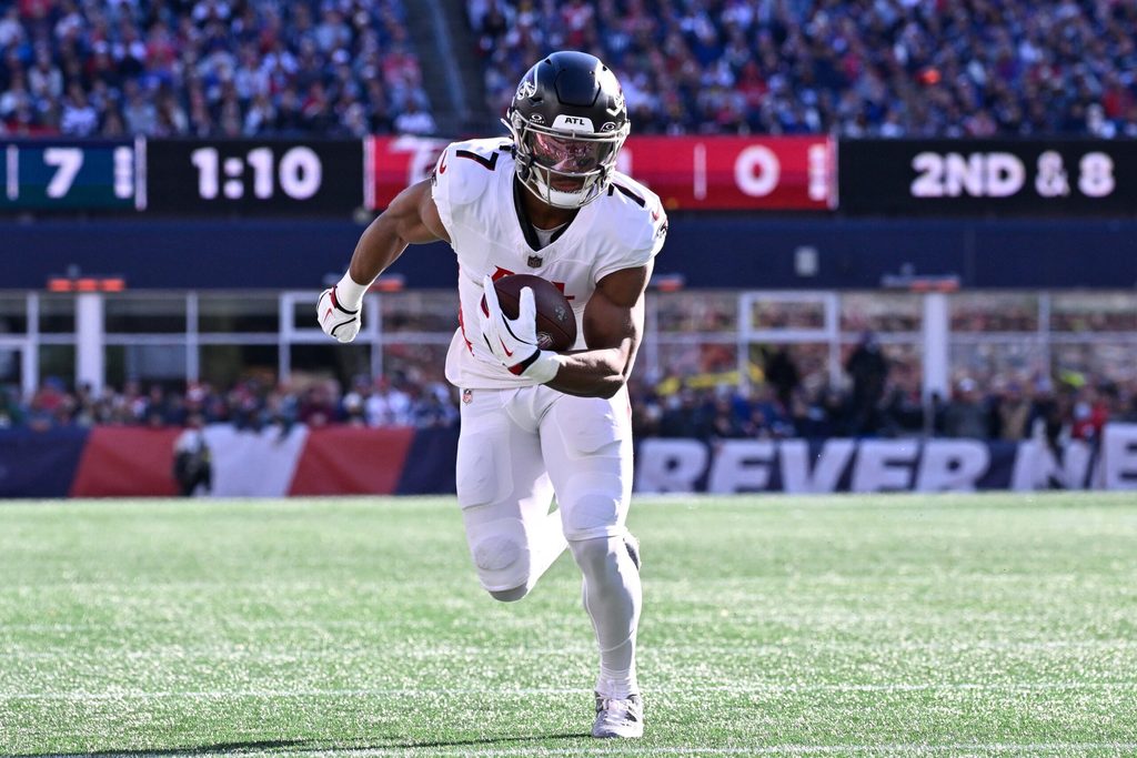 Nov 2, 2025; Foxborough, Massachusetts, USA; Atlanta Falcons running back Bijan Robinson (7) runs the ball during the first half against the New England Patriots at Gillette Stadium. Mandatory Credit: Eric Canha-Imagn Images