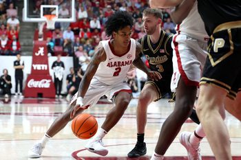 Nov 13, 2025; Tuscaloosa, Alabama, USA; Purdue Boilermakers guard Braden Smith (3) guards Alabama Crimson Tide guard Aden Holloway (2) during the second half at Coleman Coliseum. Mandatory Credit: David Leong-Imagn Images