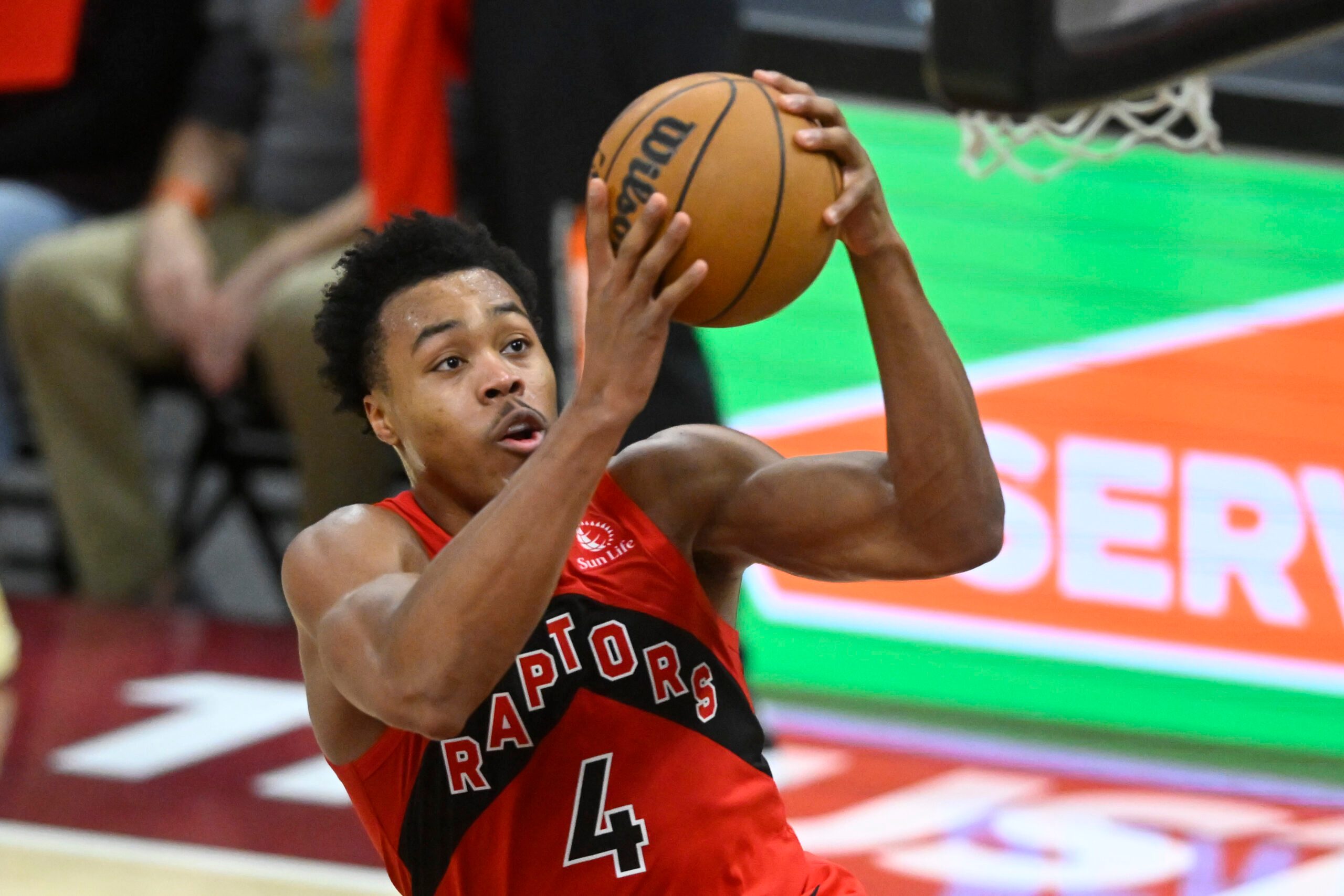 Nov 13, 2025; Cleveland, Ohio, USA; Toronto Raptors forward Scottie Barnes (4) drives to the basket in the fourth quarter against the Cleveland Cavaliers at Rocket Arena. Mandatory Credit: David Richard-Imagn Images