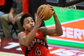 Nov 13, 2025; Cleveland, Ohio, USA; Toronto Raptors forward Scottie Barnes (4) drives to the basket in the fourth quarter against the Cleveland Cavaliers at Rocket Arena. Mandatory Credit: David Richard-Imagn Images