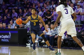 Nov 13, 2025; Manhattan, Kansas, USA; California Golden Bears guard Semetri Carr (3) brings the ball up court against Kansas State Wildcats guard C.J. Jones (3) during the second half at Bramlage Coliseum. Mandatory Credit: Scott Sewell-Imagn Images