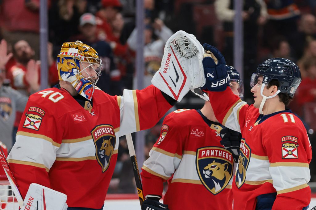 Nov 13, 2025; Sunrise, Florida, USA; Florida Panthers goaltender Daniil Tarasov (40) and right wing Mackie Samoskevich (11) celebrate after the game against the Washington Capitals at Amerant Bank Arena. Mandatory Credit: Sam Navarro-Imagn Images