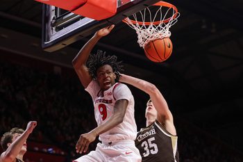 Nov 14, 2025; Piscataway, New Jersey, USA; Rutgers Scarlet Knights forward Dylan Grant (9) dunks the ball during the second half against the Lehigh Mountain Hawks at Jersey Mike's Arena. Mandatory Credit: Vincent Carchietta-Imagn Images