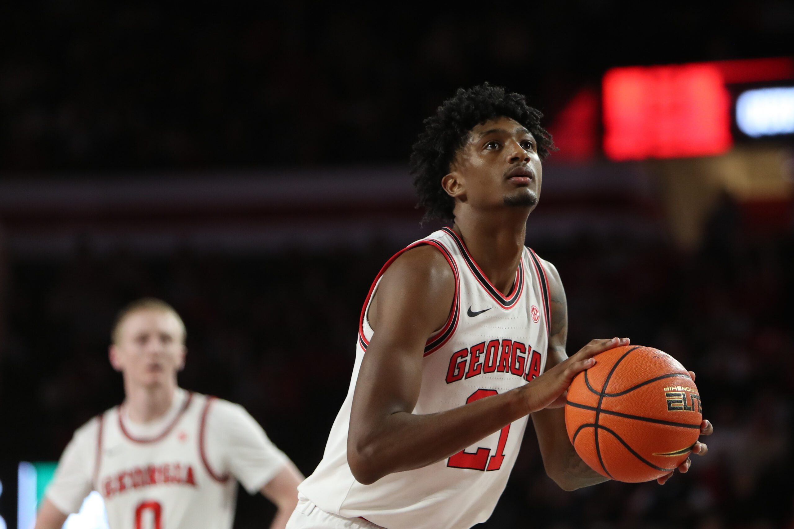 Nov 14, 2025; Athens, Georgia, USA; Georgia Bulldogs forward Jake Wilkins (21) shoots a free throw against the Georgia Tech Yellow Jackets during the first half at Stegeman Coliseum. Mandatory Credit: Mady Mertens-Imagn Images