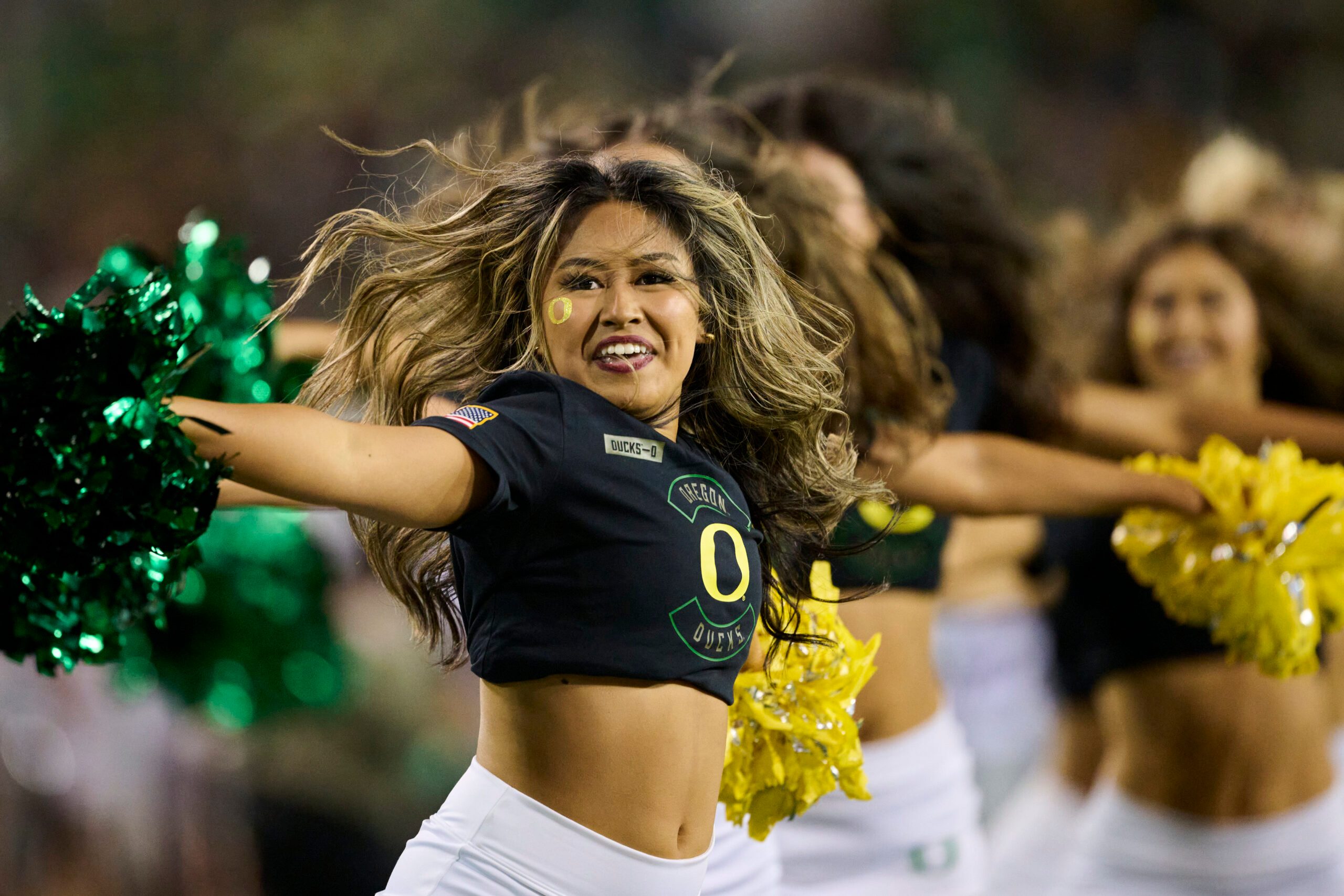 Nov 14, 2025; Eugene, Oregon, USA; The Oregon Ducks cheerleaders perform during the second half in a game between the Oregon Ducks and the Minnesota Golden Gophers at Autzen Stadium. Mandatory Credit: Troy Wayrynen-Imagn Images