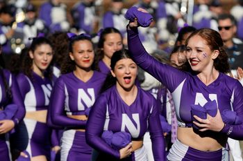 Nov 15, 2025; Chicago, Illinois, USA; Northwestern Wildcats cheerleaders during the second half at Wrigley Field. Mandatory Credit: David Banks-Imagn Images