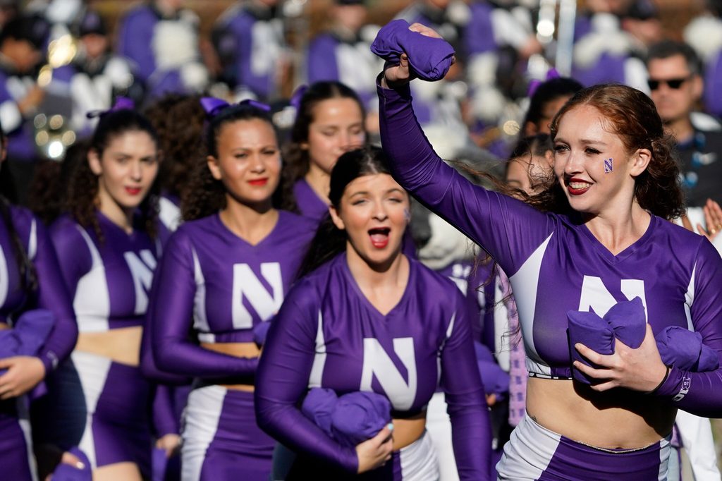 Nov 15, 2025; Chicago, Illinois, USA; Northwestern Wildcats cheerleaders during the second half at Wrigley Field. Mandatory Credit: David Banks-Imagn Images