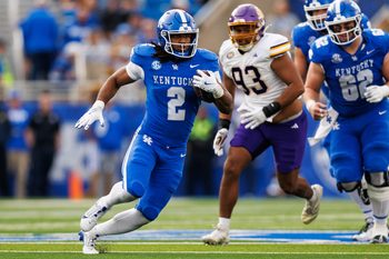 Nov 15, 2025; Lexington, Kentucky, USA; Kentucky Wildcats running back Dante Dowdell (2) runs the ball during the fourth quarter against the Tennessee Tech Golden Eagles at Kroger Field. Mandatory Credit: Jordan Prather-Imagn Images