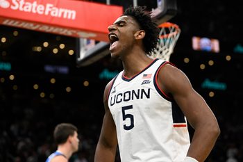 Nov 15, 2025; Boston, Massachusetts, USA; UConn Huskies forward Tarris Reed Jr. (5) reacts to a foul during the first half by the BYU Cougars at TD Garden. Mandatory Credit: Eric Canha-Imagn Images