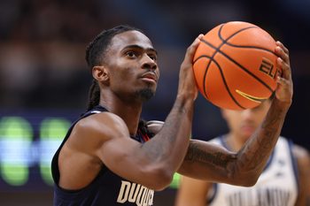Nov 15, 2025; Villanova, Pennsylvania, USA; Duquesne Dukes guard Tarence Guinyard (1) shoots a foul shot against the Villanova Wildcats during the second half at William B. Finneran Pavilion. Mandatory Credit: Bill Streicher-Imagn Images