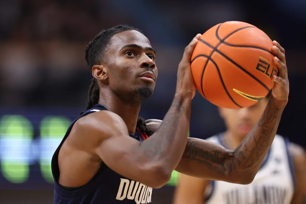 Nov 15, 2025; Villanova, Pennsylvania, USA; Duquesne Dukes guard Tarence Guinyard (1) shoots a foul shot against the Villanova Wildcats during the second half at William B. Finneran Pavilion. Mandatory Credit: Bill Streicher-Imagn Images