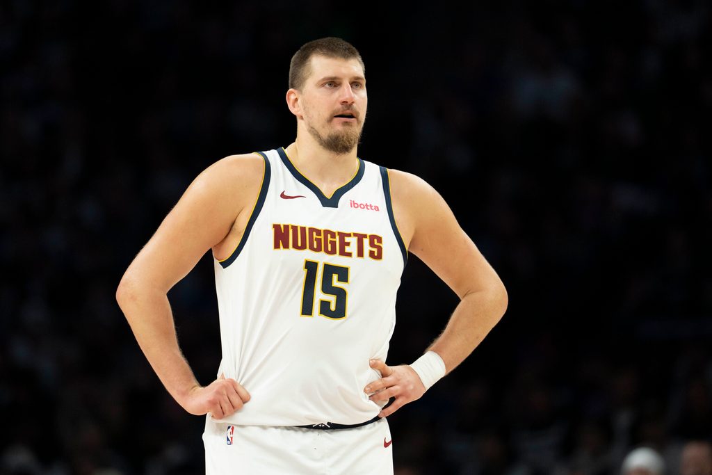 Nov 15, 2025; Minneapolis, Minnesota, USA; Denver Nuggets center Nikola Jokic (15) looks on against the Minnesota Timberwolves in the second half at Target Center. Mandatory Credit: Jesse Johnson-Imagn Images