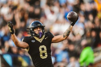 Nov 15, 2025; Winston-Salem, North Carolina, USA; Wake Forest Demon Deacons wide receiver Carlos Hernandez (8) reacts after a play against the North Carolina Tar Heels at Allegacy Federal Credit Union Stadium. Mandatory Credit: Wake Forest Athletics via Imagn Images