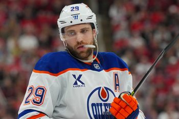 Nov 15, 2025; Raleigh, North Carolina, USA;  Edmonton Oilers center Leon Draisaitl (29) looks on against the Carolina Hurricanes during the second period at Lenovo Center. Mandatory Credit: James Guillory-Imagn Images