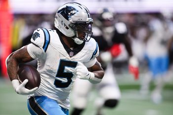 Nov 16, 2025; Atlanta, Georgia, USA; Carolina Panthers running back Rico Dowdle (5) runs with the ball in the third quarter against the Carolina Panthers at Mercedes-Benz Stadium. Mandatory Credit: Brett Davis-Imagn Images