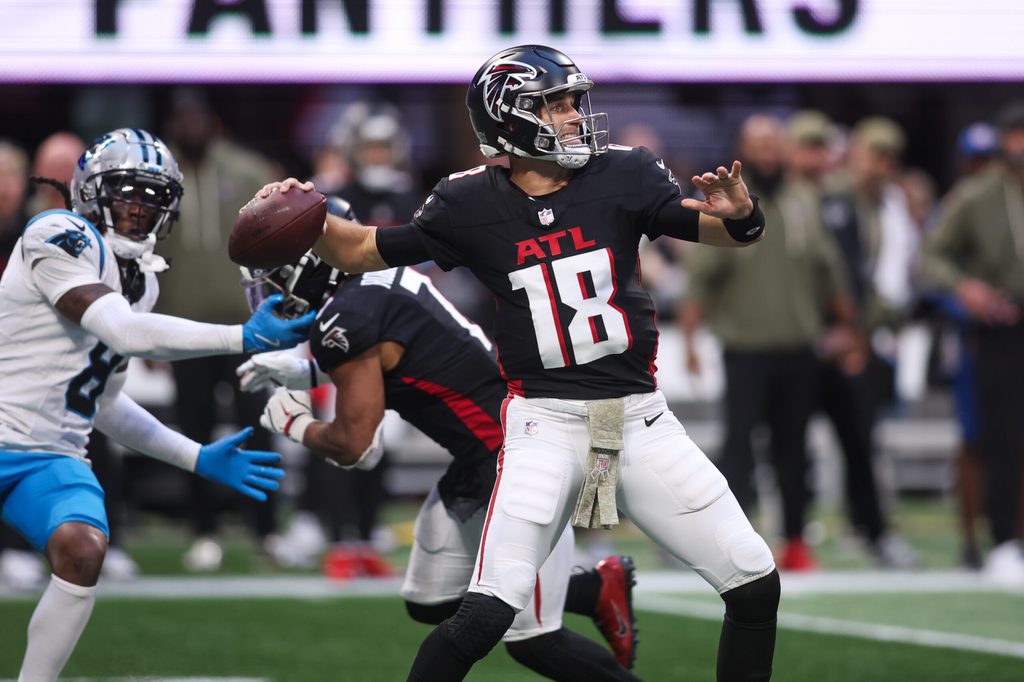 Nov 16, 2025; Atlanta, Georgia, USA; Atlanta Falcons quarterback Kirk Cousins (18) looks to throw the ball in the fourth quarter against the Carolina Panthers at Mercedes-Benz Stadium. Mandatory Credit: Brett Davis-Imagn Images