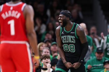 Nov 16, 2025; Boston, Massachusetts, USA; Boston Celtics center Neemias Queta (88) celebrates after a basket during the second half against the Los Angeles Clippers at TD Garden. Mandatory Credit: Paul Rutherford-Imagn Images