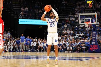 Nov 16, 2025; Memphis, Tennessee, USA; Memphis Tigers guard Sincere Parker (23) shoots the ball against the UNLV Rebels during the first half at FedExForum. Mandatory Credit: Wesley Hale-Imagn Images