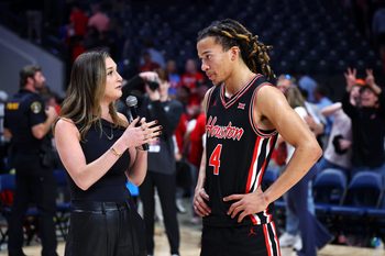 Nov 16, 2025; Birmingham, Alabama, USA; Houston Cougars guard Kingston Flemings (4) is interviewed after their victory against the Auburn Tigers at Legacy Arena at BJCC. Mandatory Credit: David Leong-Imagn Images