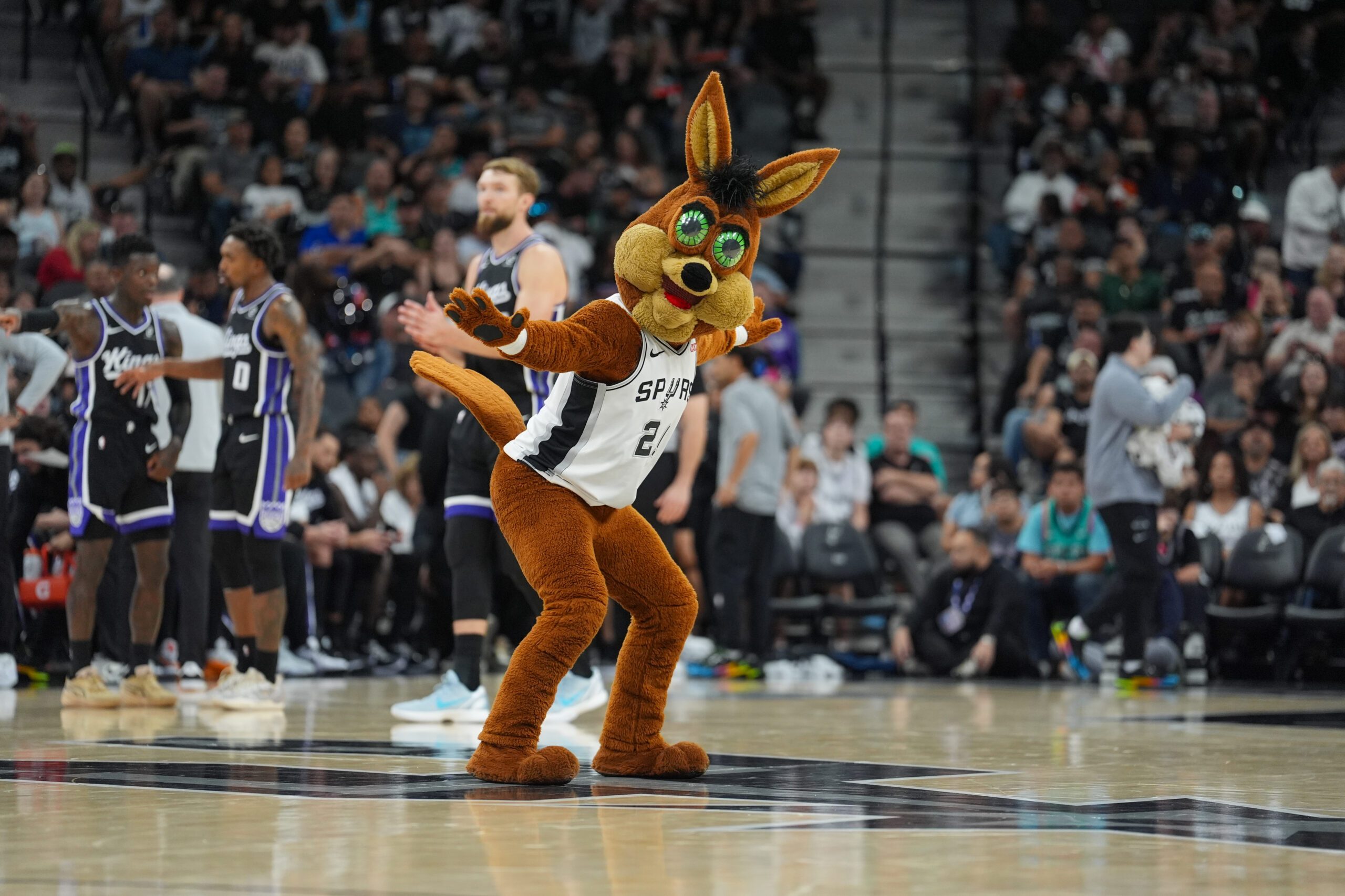 Nov 16, 2025; San Antonio, Texas, USA; The San Antonio Spurs Coyote performs in the second half against the Sacramento Kings at Frost Bank Center. Mandatory Credit: Daniel Dunn-Imagn Images