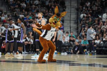 Nov 16, 2025; San Antonio, Texas, USA; The San Antonio Spurs Coyote performs in the second half against the Sacramento Kings at Frost Bank Center. Mandatory Credit: Daniel Dunn-Imagn Images