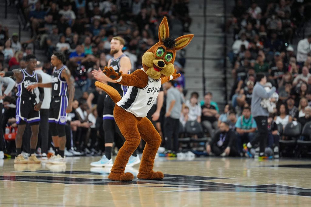 Nov 16, 2025; San Antonio, Texas, USA; The San Antonio Spurs Coyote performs in the second half against the Sacramento Kings at Frost Bank Center. Mandatory Credit: Daniel Dunn-Imagn Images