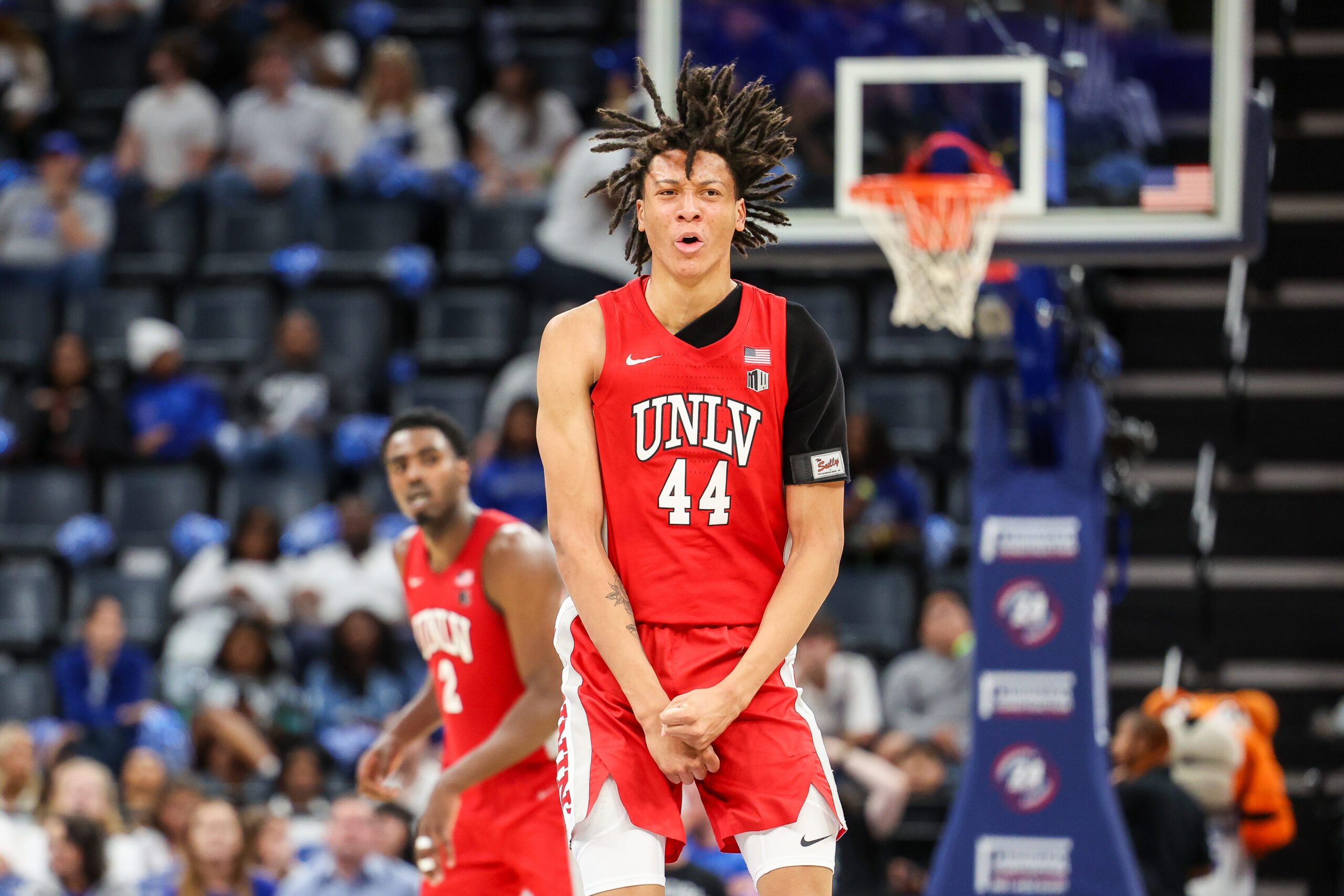 Nov 16, 2025; Memphis, Tennessee, USA; UNLV Rebels forward Tyrin Jones (44) reacts against the Memphis Tigers during the second half at FedExForum. Mandatory Credit: Wesley Hale-Imagn Images