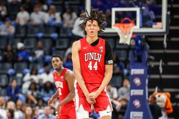 Nov 16, 2025; Memphis, Tennessee, USA; UNLV Rebels forward Tyrin Jones (44) reacts against the Memphis Tigers during the second half at FedExForum. Mandatory Credit: Wesley Hale-Imagn Images