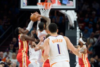 Nov 16, 2025; Phoenix, Arizona, USA; A general view as Phoenix Suns guard Devin Booker (1) watches play under the basket from center court during the second half of a game against Atlanta Hawks at Mortgage Matchup Center. Mandatory Credit: Allan Henry-Imagn Images
