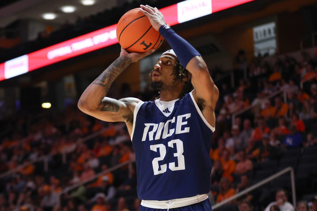 Nov 17, 2025; Knoxville, Tennessee, USA; Rice Owls guard Nick Anderson (23) shoots a three point basket during the second half against the Tennessee Volunteers at Thompson-Boling Arena at Food City Center. Mandatory Credit: Randy Sartin-Imagn Images