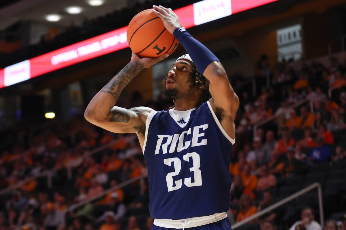 Nov 17, 2025; Knoxville, Tennessee, USA; Rice Owls guard Nick Anderson (23) shoots a three point basket during the second half against the Tennessee Volunteers at Thompson-Boling Arena at Food City Center. Mandatory Credit: Randy Sartin-Imagn Images