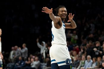 Nov 17, 2025; Minneapolis, Minnesota, USA; Minnesota Timberwolves guard Bones Hyland (8) celebrates after making a shot against the Dallas Mavericks in the second half at Target Center. Mandatory Credit: Jesse Johnson-Imagn Images
