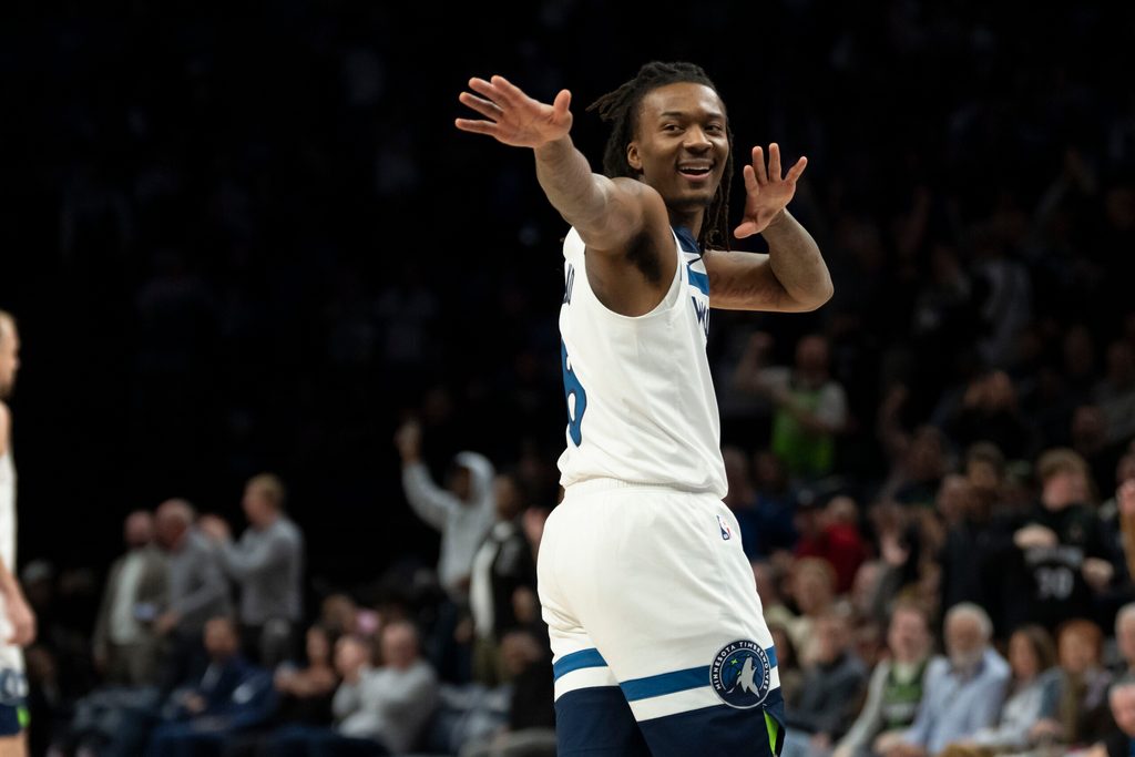 Nov 17, 2025; Minneapolis, Minnesota, USA; Minnesota Timberwolves guard Bones Hyland (8) celebrates after making a shot against the Dallas Mavericks in the second half at Target Center. Mandatory Credit: Jesse Johnson-Imagn Images
