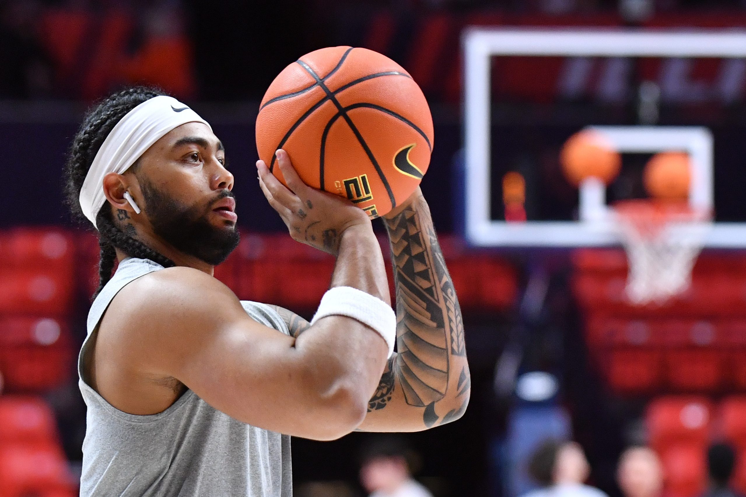 Nov 14, 2025; Champaign, Illinois, USA;  Illinois Fighting Illini guard Kylan Boswell (4) warms up before a game against Colgate at State Farm Center. Mandatory Credit: Ron Johnson-Imagn Images