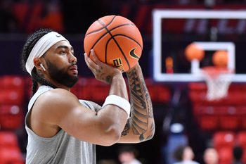 Nov 14, 2025; Champaign, Illinois, USA;  Illinois Fighting Illini guard Kylan Boswell (4) warms up before a game against Colgate at State Farm Center. Mandatory Credit: Ron Johnson-Imagn Images