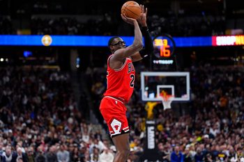 Nov 17, 2025; Denver, Colorado, USA; Chicago Bulls forward/center Jalen Smith (25) prepares to shoot the ball in the second quarter against the Denver Nuggets at Ball Arena. Mandatory Credit: Ron Chenoy-Imagn Images
