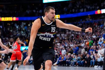Nov 17, 2025; Denver, Colorado, USA; Denver Nuggets center Nikola Jokic (15) during the fourth quarter against the Chicago Bulls at Ball Arena. Mandatory Credit: Ron Chenoy-Imagn Images
