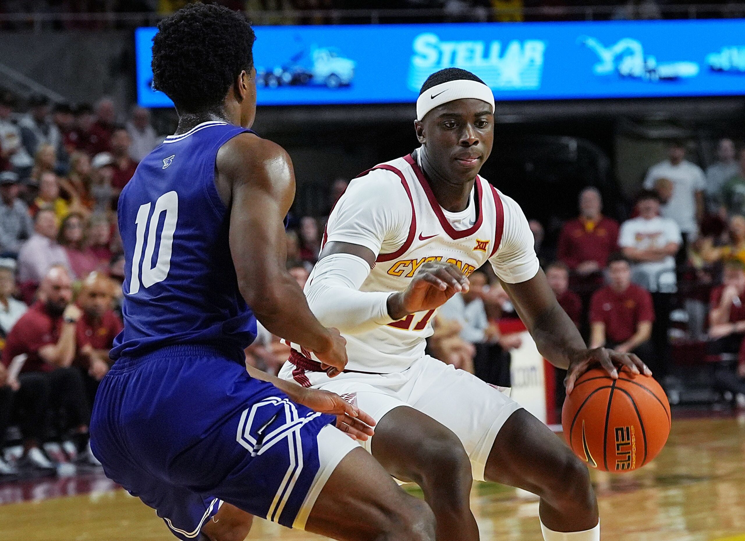 Iowa State Cyclones forward ard Killyan Toure (27) drives with the ball around Stonehill Skyhawks guard Hermann Koffi (10) during the first half in the NCAA basketball on Nov. 17, 2025, at Hilton Coliseum in Ames, Iowa.Iowa.