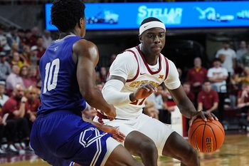 Iowa State Cyclones forward ard Killyan Toure (27) drives with the ball around Stonehill Skyhawks guard Hermann Koffi (10) during the first half in the NCAA basketball on Nov. 17, 2025, at Hilton Coliseum in Ames, Iowa.Iowa.