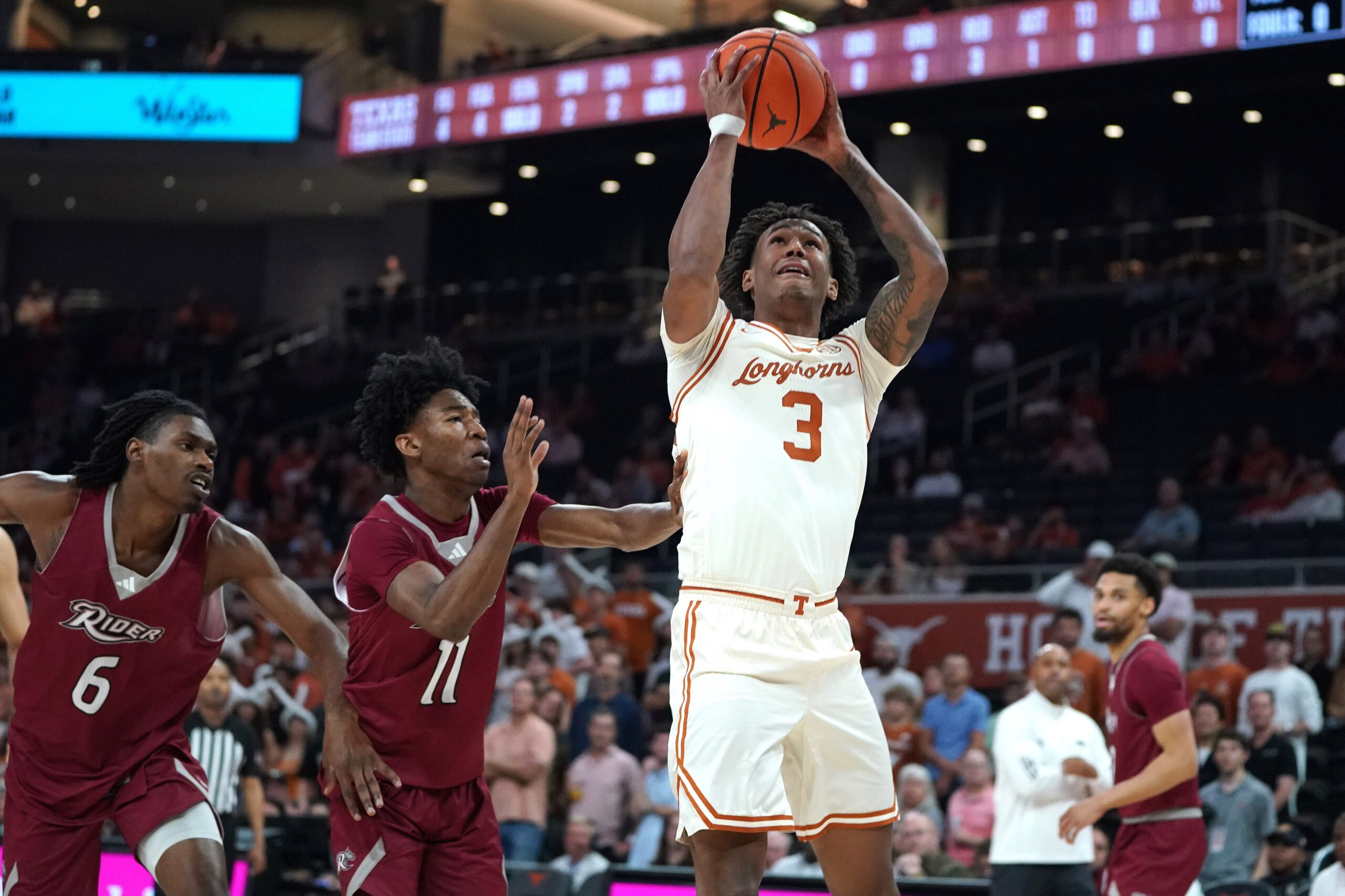 Nov 18, 2025; Austin, Texas, USA; Texas Longhorns guard Dailyn Swain (3) drives the ball to the basket during the first half against the Rider Broncs at Moody Center. Mandatory Credit: Dustin Safranek-Imagn Images