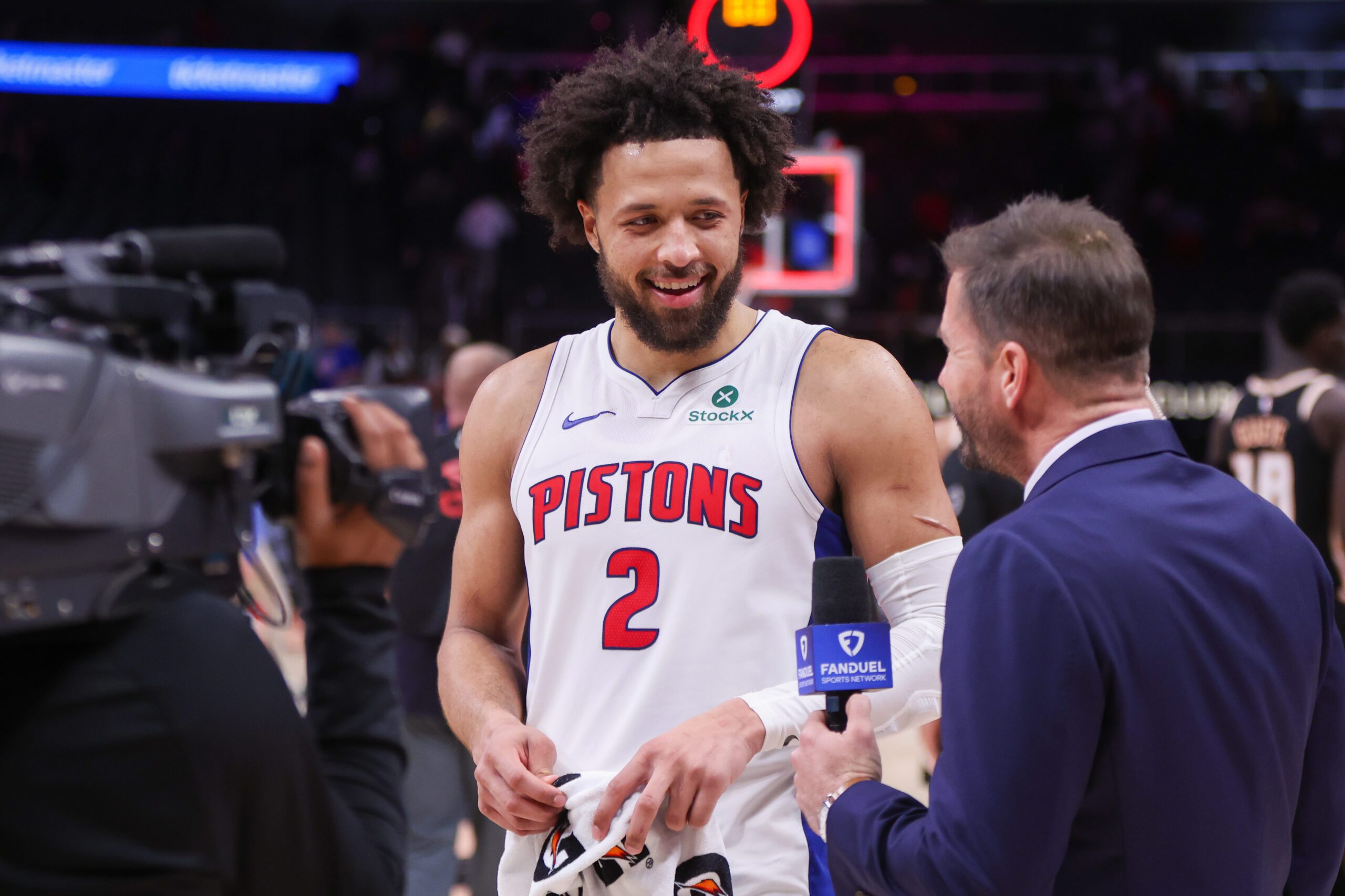 Nov 18, 2025; Atlanta, Georgia, USA; Detroit Pistons guard Cade Cunningham (2) does an interview after a victory over the Atlanta Hawks at State Farm Arena. Mandatory Credit: Brett Davis-Imagn Images