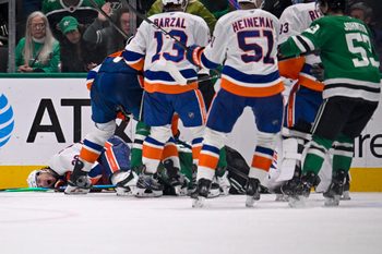 Nov 18, 2025; Dallas, Texas, USA; Dallas Stars right wing Mikko Rantanen (96) is called for a game misconduct penalty for boarding on New York Islanders defenseman Alexander Romanov (28) during the third period at the American Airlines Center. Mandatory Credit: Jerome Miron-Imagn Images