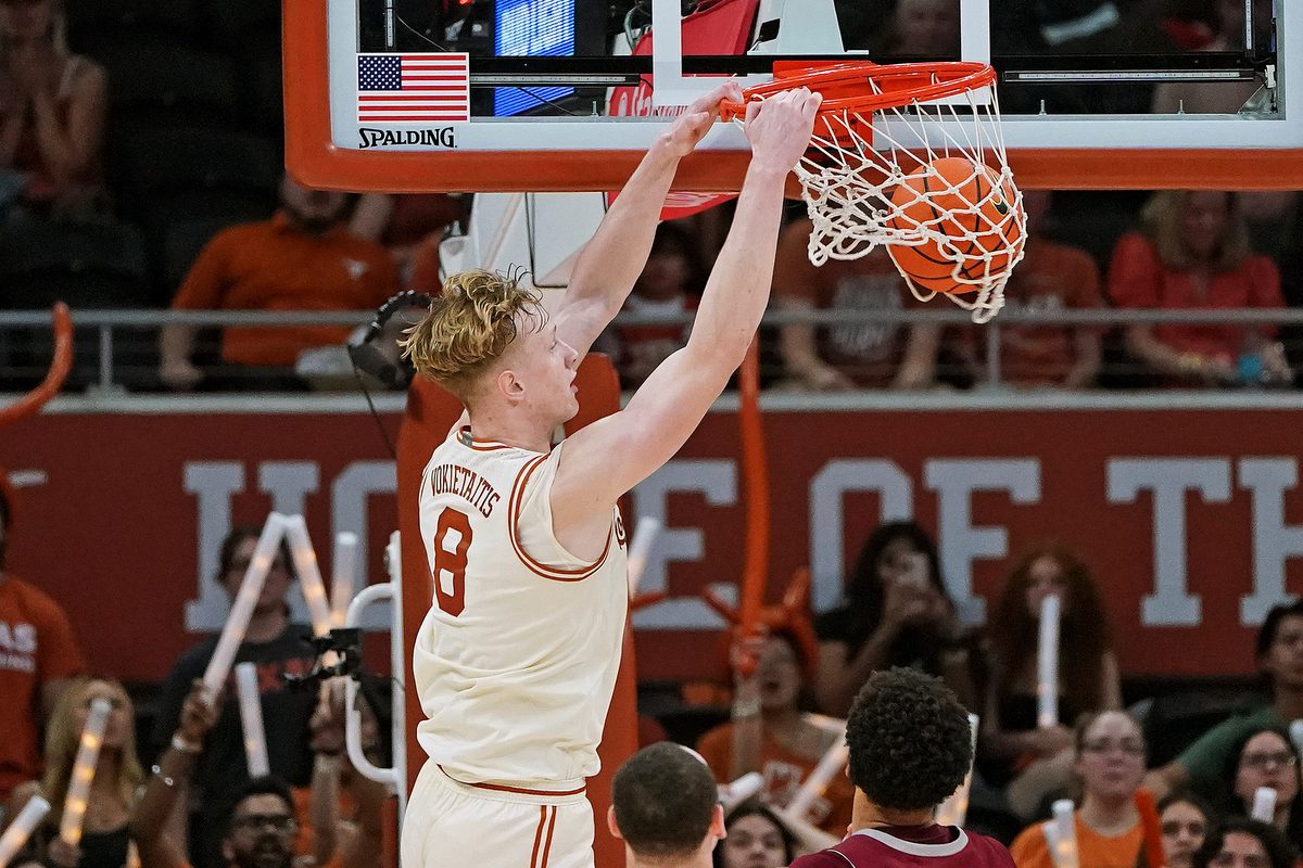 Nov 18, 2025; Austin, Texas, USA; Texas Longhorns center Matas Vokietaitis (8) dunks against the Rider Broncs during the second half at Moody Center. Mandatory Credit: Dustin Safranek-Imagn Images